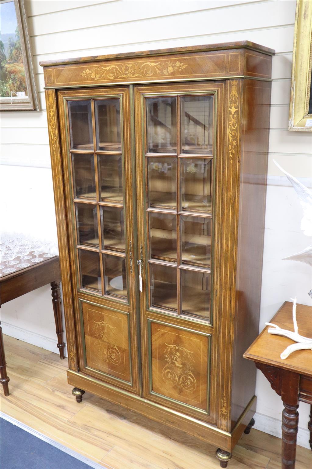 A 19th century French marquetry inlaid rosewood vitrine, width 100cm, depth 32cm, height 184cm